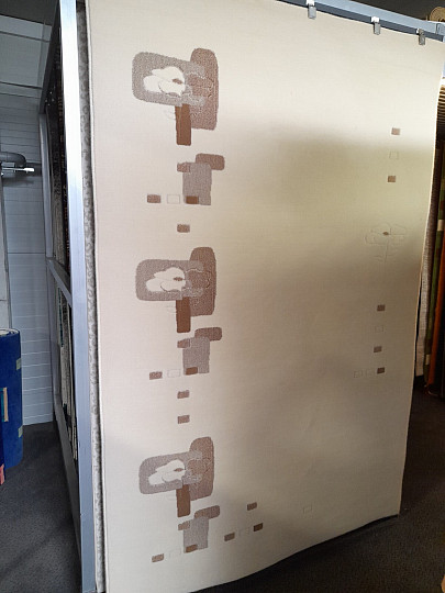 Vlněný koberec světle béžový